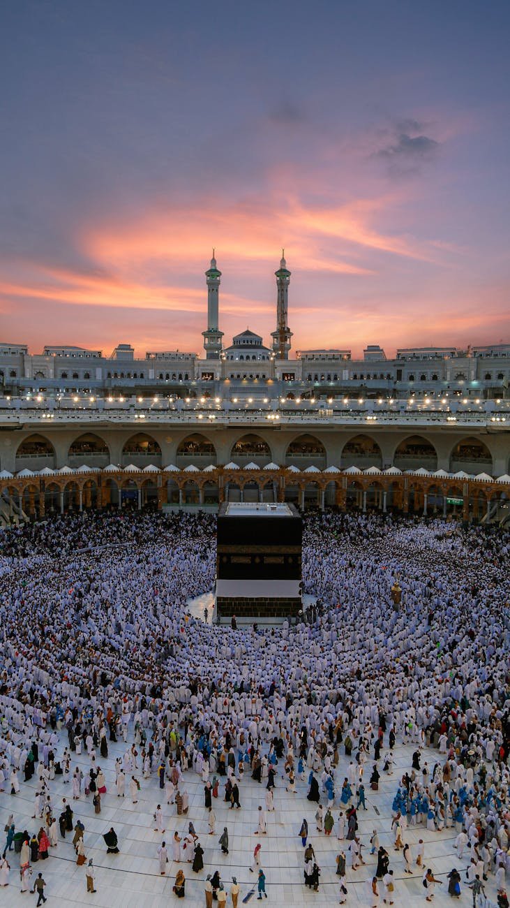 crowd around kaaba in mecca at sunset