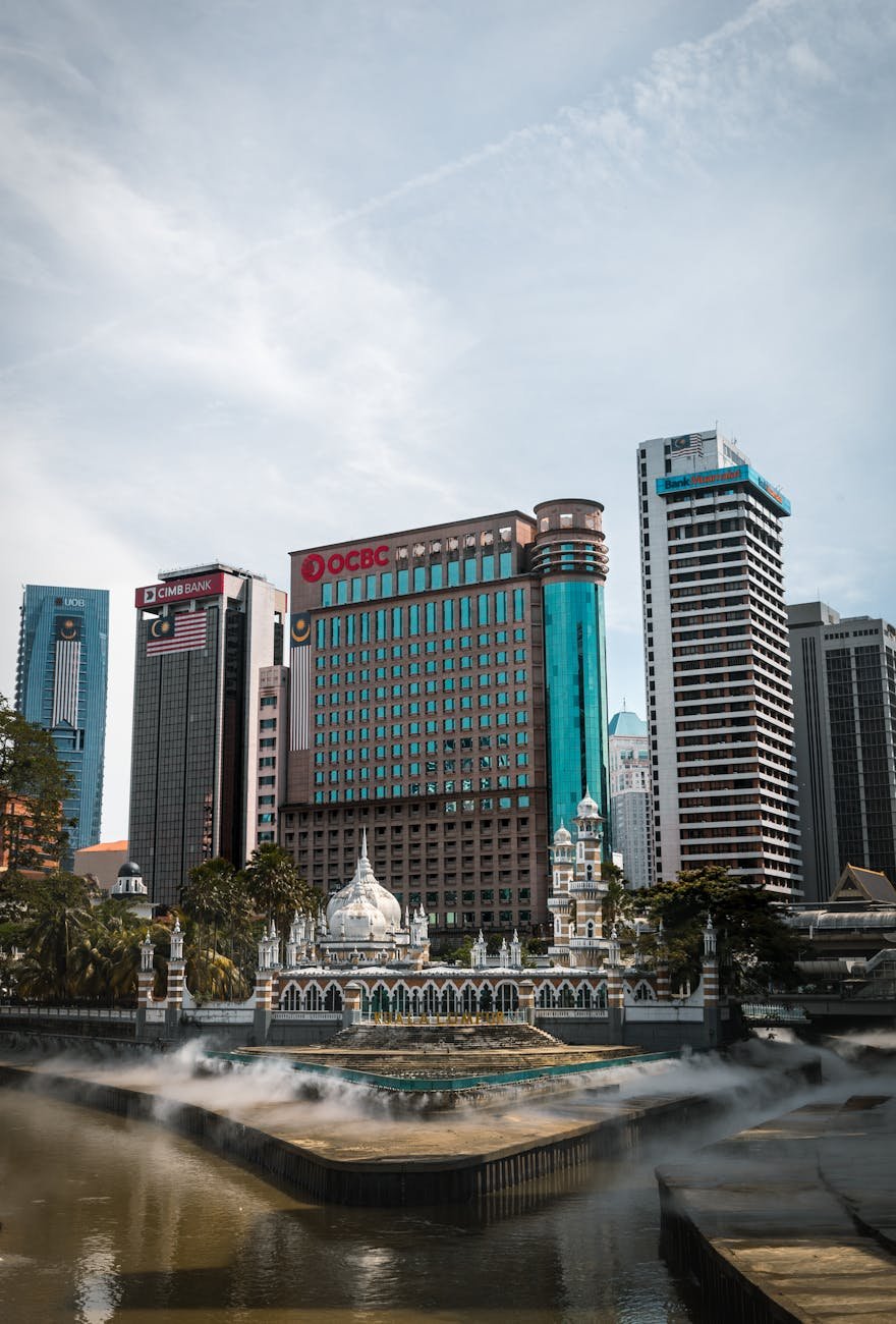 view of a mosque and skyscrapers in downtown kuala lumpur malaysia
