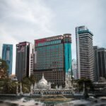 view of a mosque and skyscrapers in downtown kuala lumpur malaysia