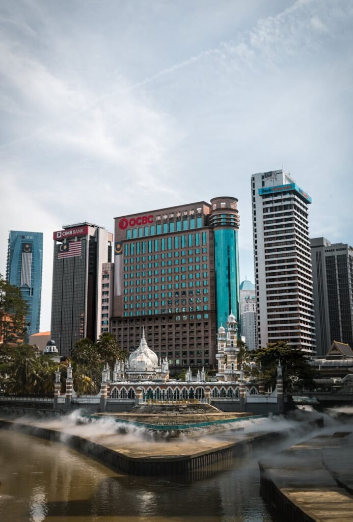 view of a mosque and skyscrapers in downtown kuala lumpur malaysia