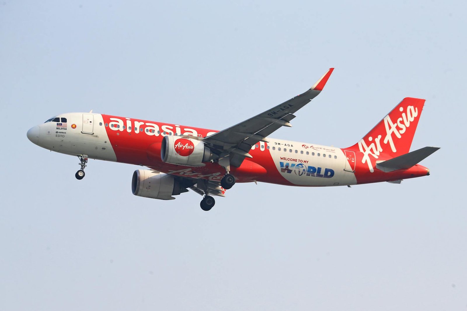 view of a flying airasia airliner