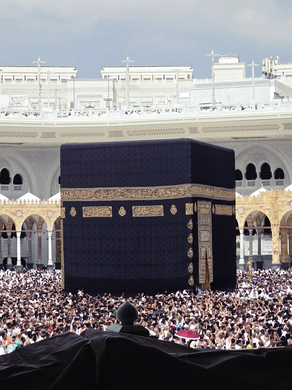 hajj pilgrims gather around the kaaba