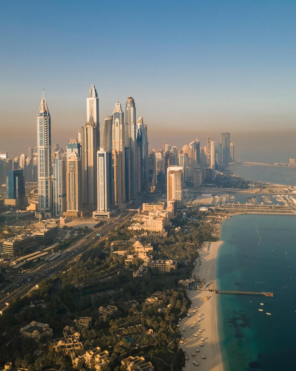 aerial view of dubai marina skyline at sunset
