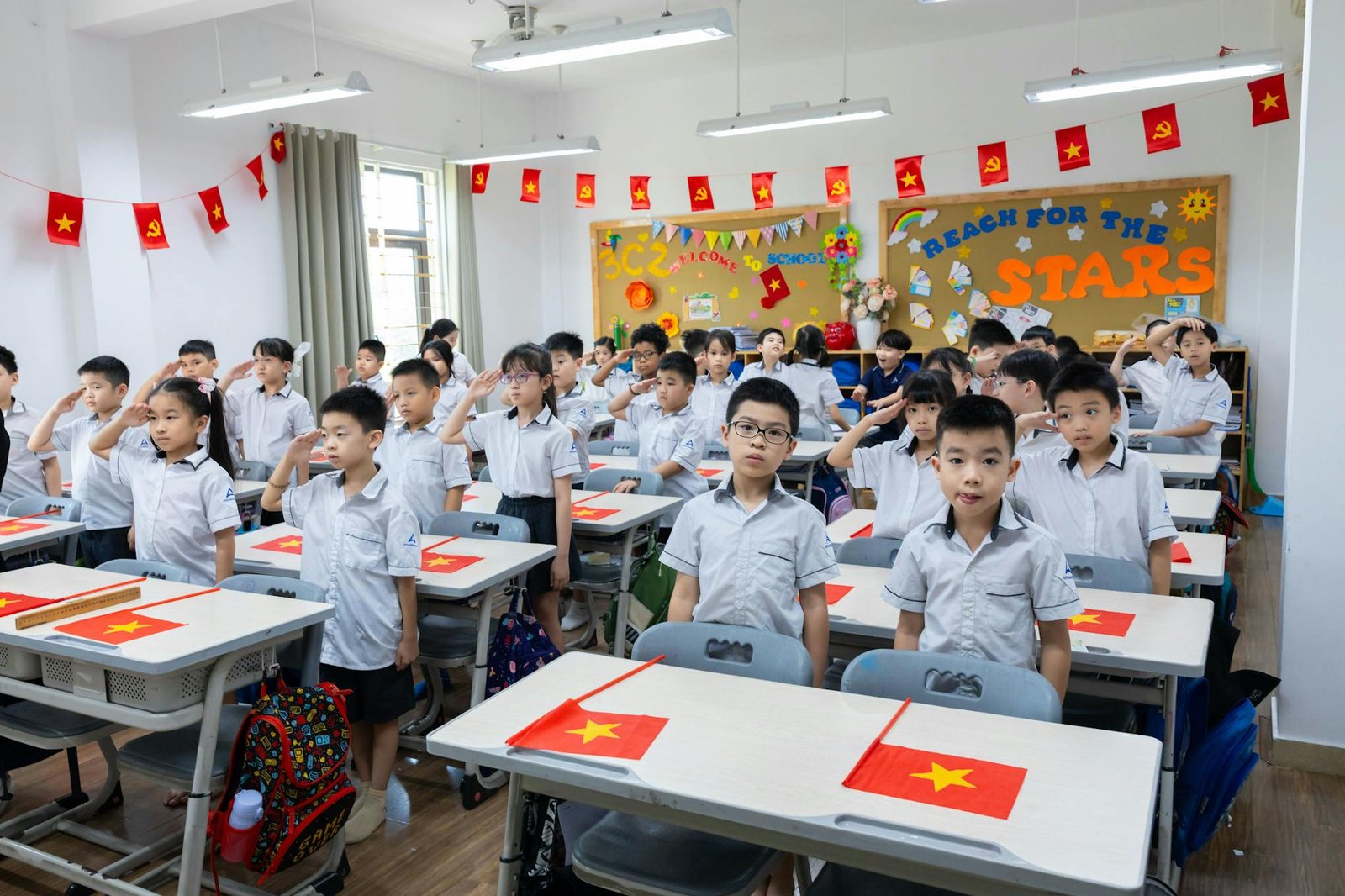 classroom of students saluting in vietnam