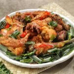 spicy crispy chicken dish with herbs and chili