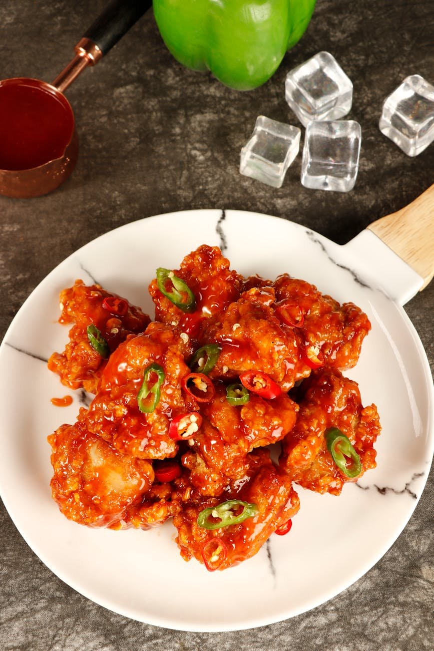 plate with a spicy chicken dish