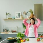a woman with a pineapple on her head
