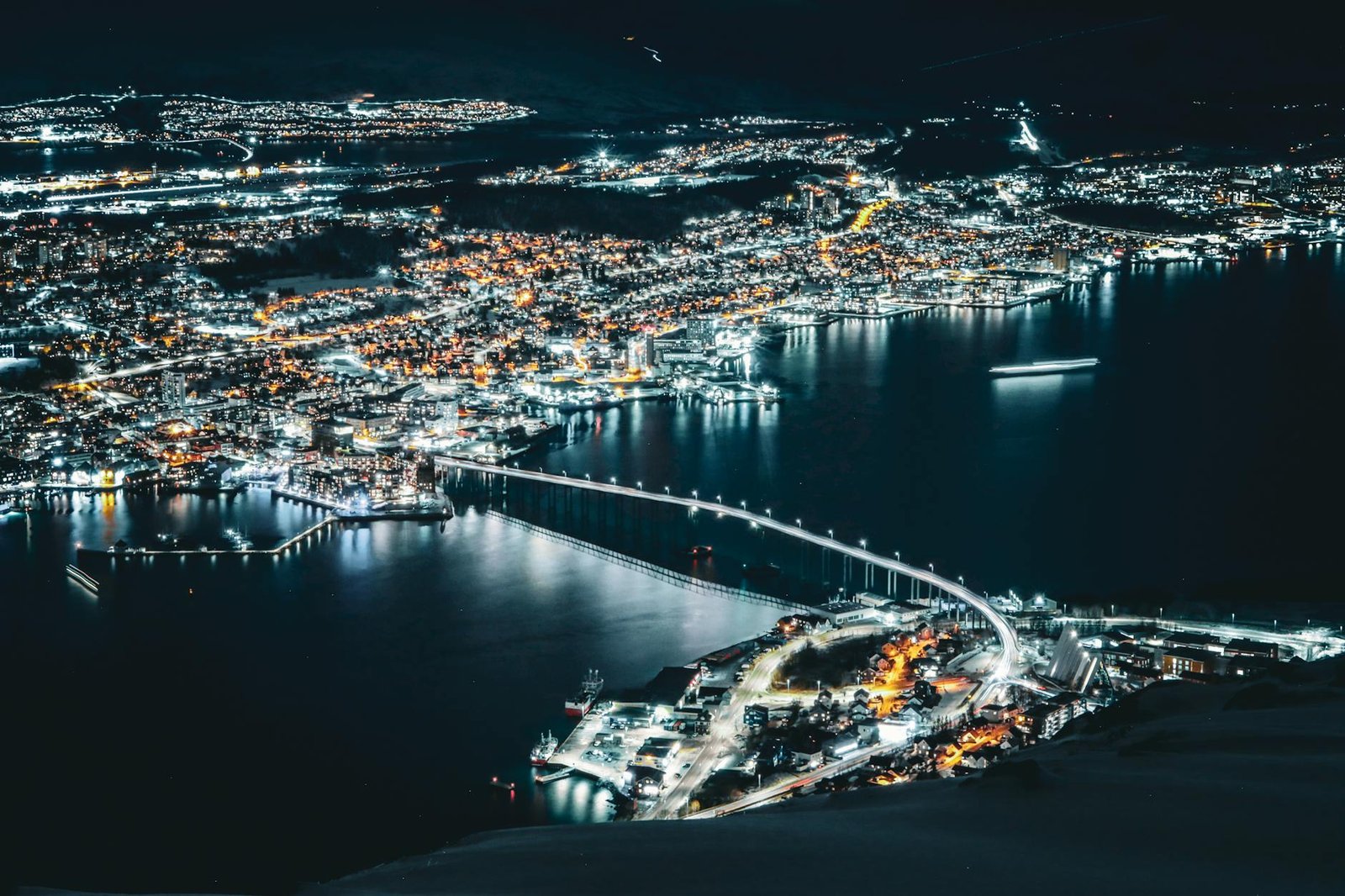 stunning night aerial view of tromso in winter