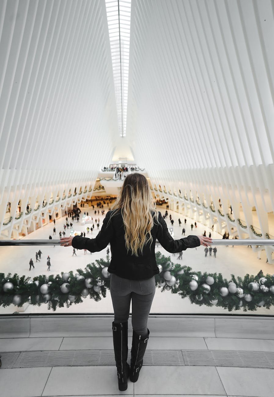 a woman standing in balcony