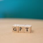 wooden letter blocks spelling gpt in focus