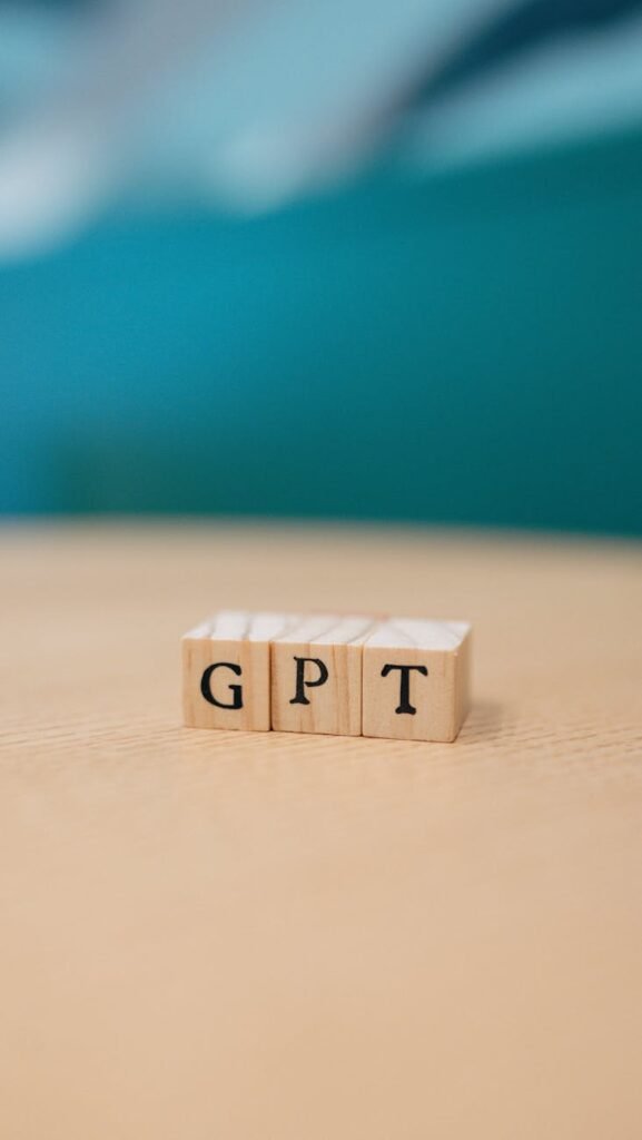 wooden letter blocks spelling gpt in focus
