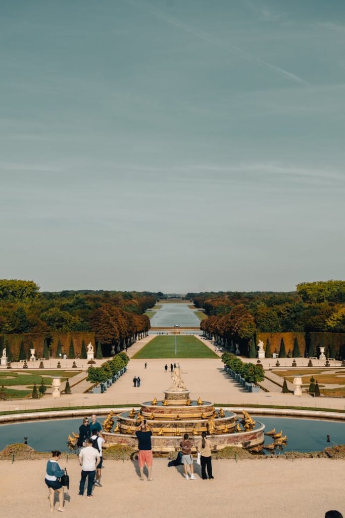view of versailles palace gardens in fall