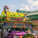 colorful chiva bus at medellin flower festival