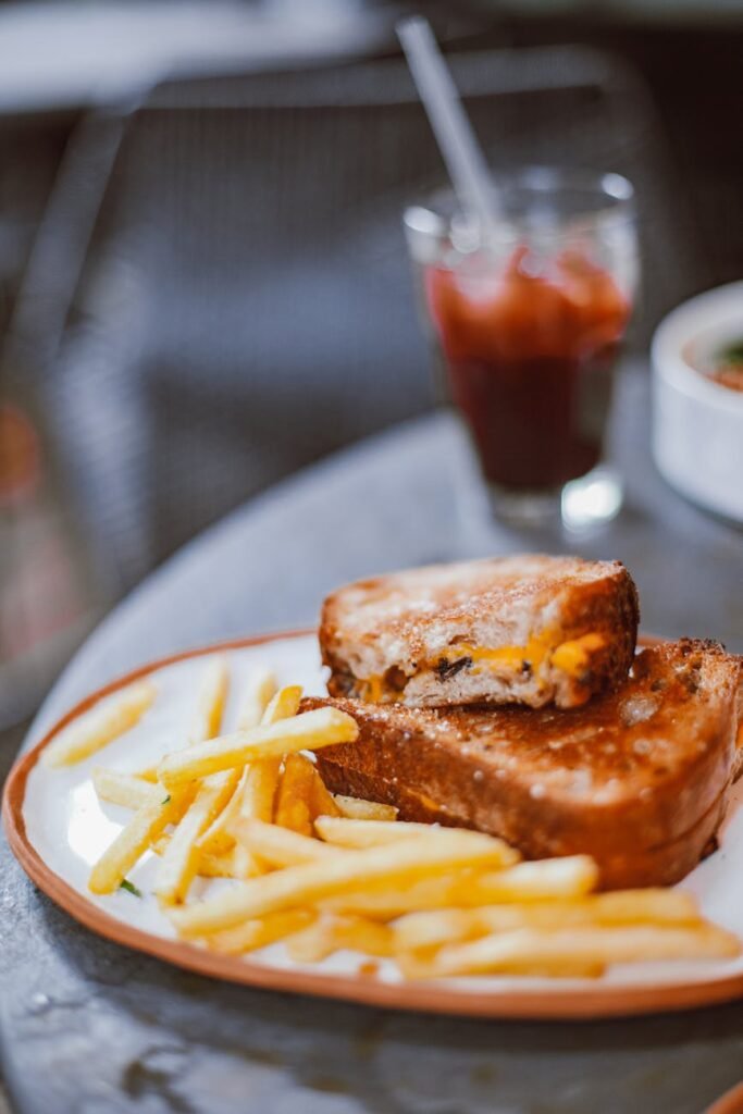toasted bread and fries on a plate