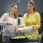 a women preparing food in the kitchen