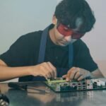 a man working on a motherboard