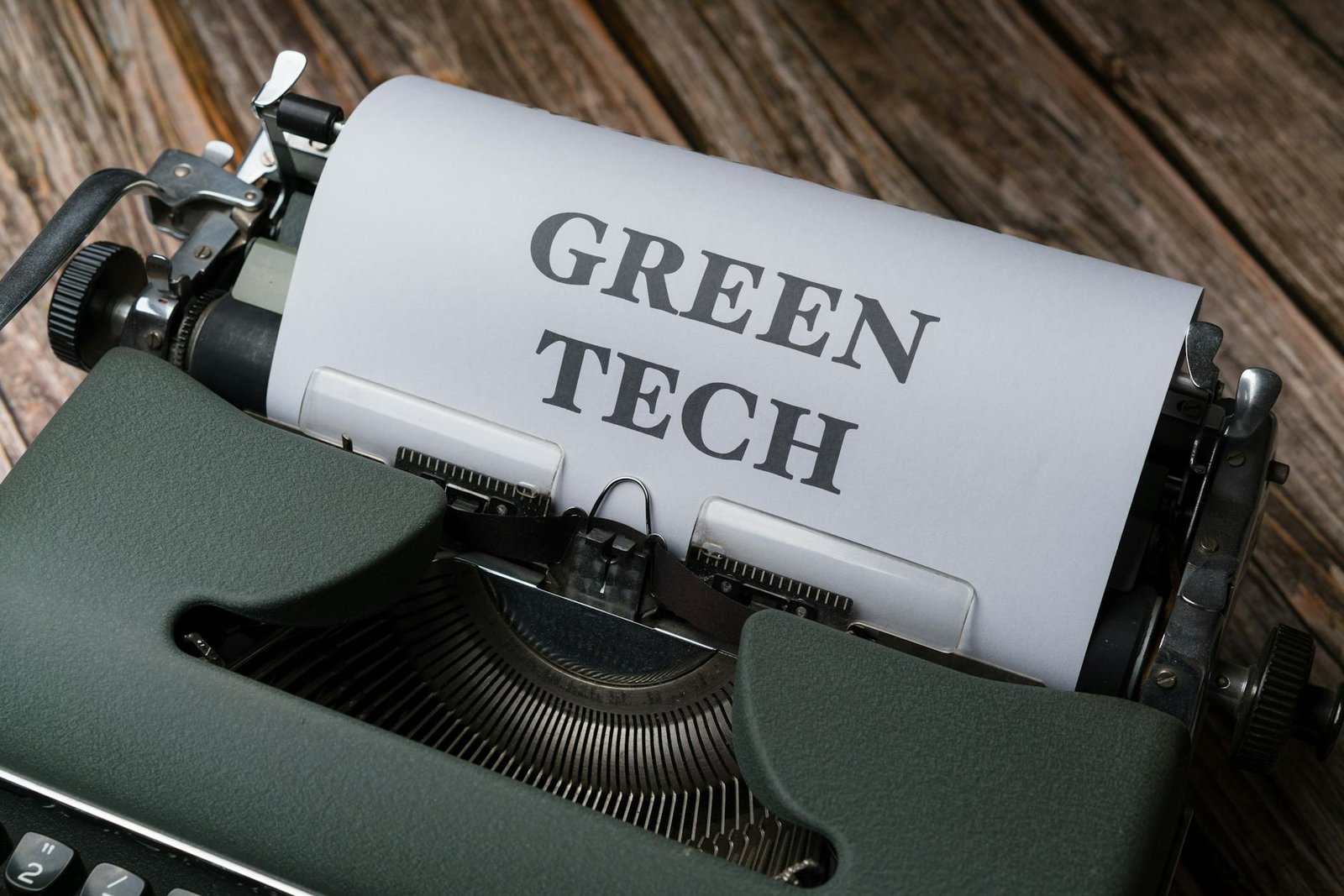 a typewriter with the words green tech on it