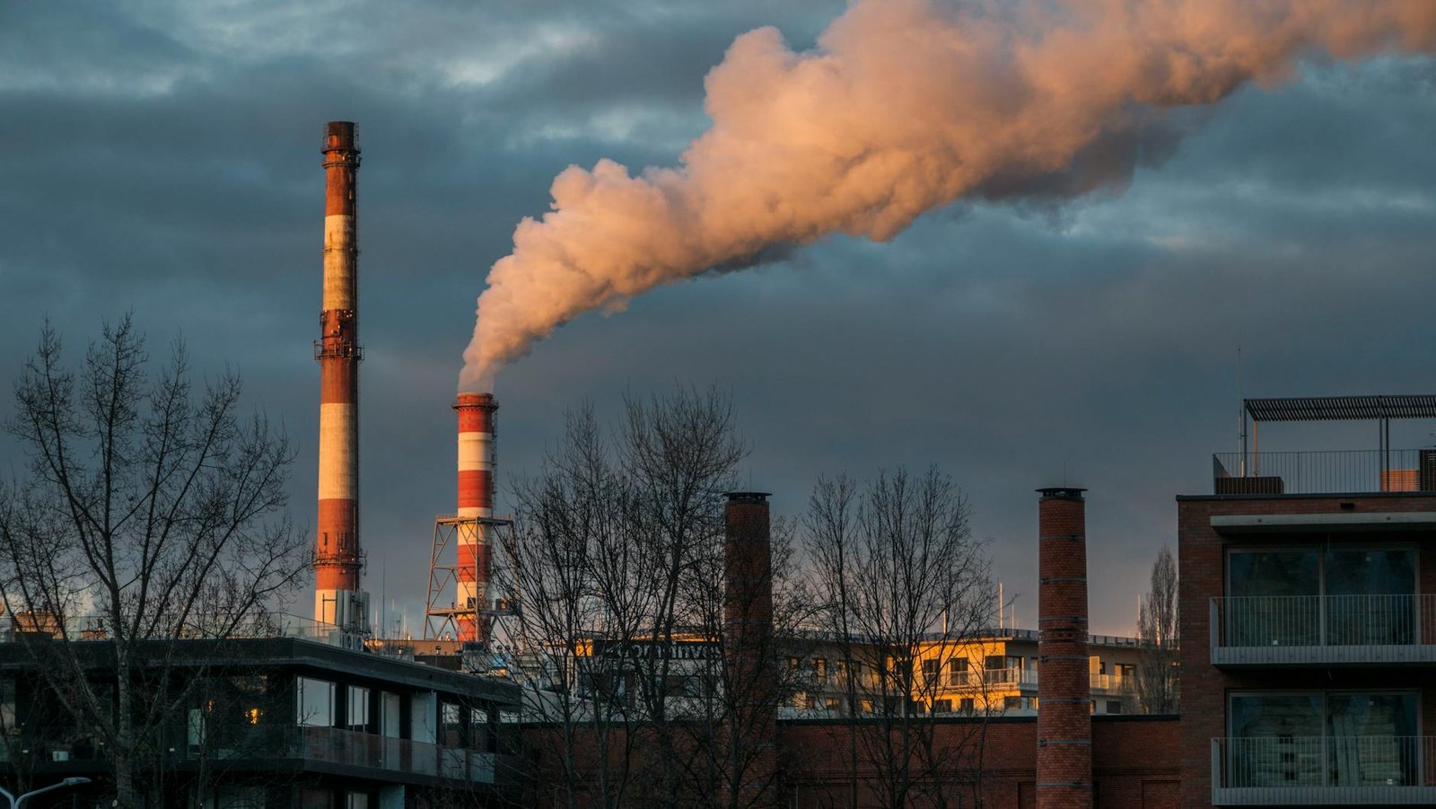 industrial chimneys emitting smoke in wroclaw