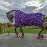 war horse sculpture with poppy quilt in featherstone