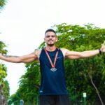 triumphant athlete celebrating victory outdoors