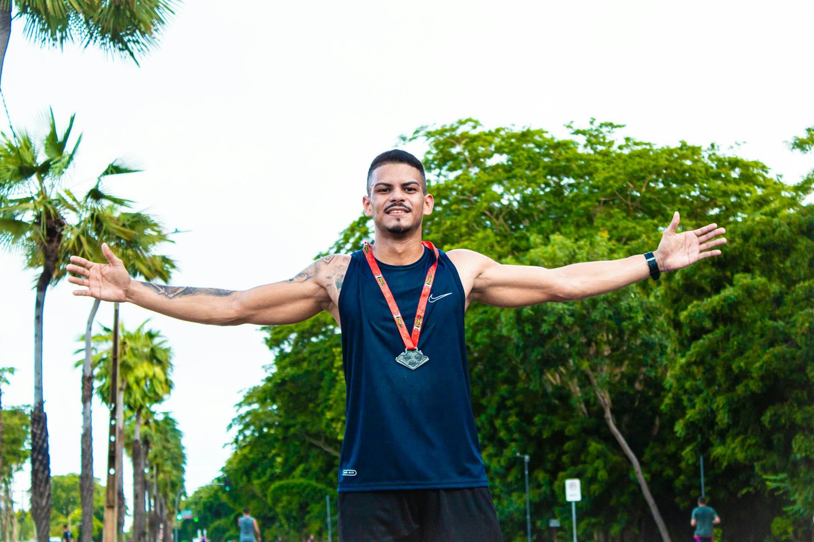 triumphant athlete celebrating victory outdoors