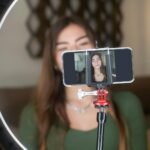 a woman using a smartphone in blogging