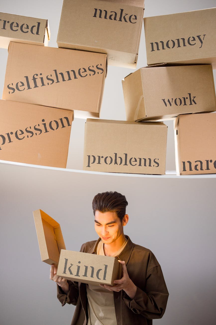 a man looking at the box