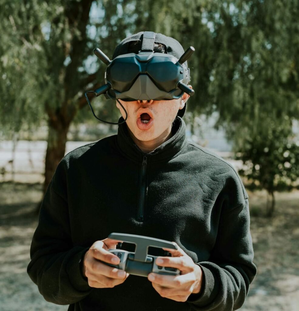 man playing with vr goggles and controller