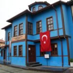 traditional ottoman house with turkish flag
