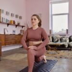 a woman stretching her legs