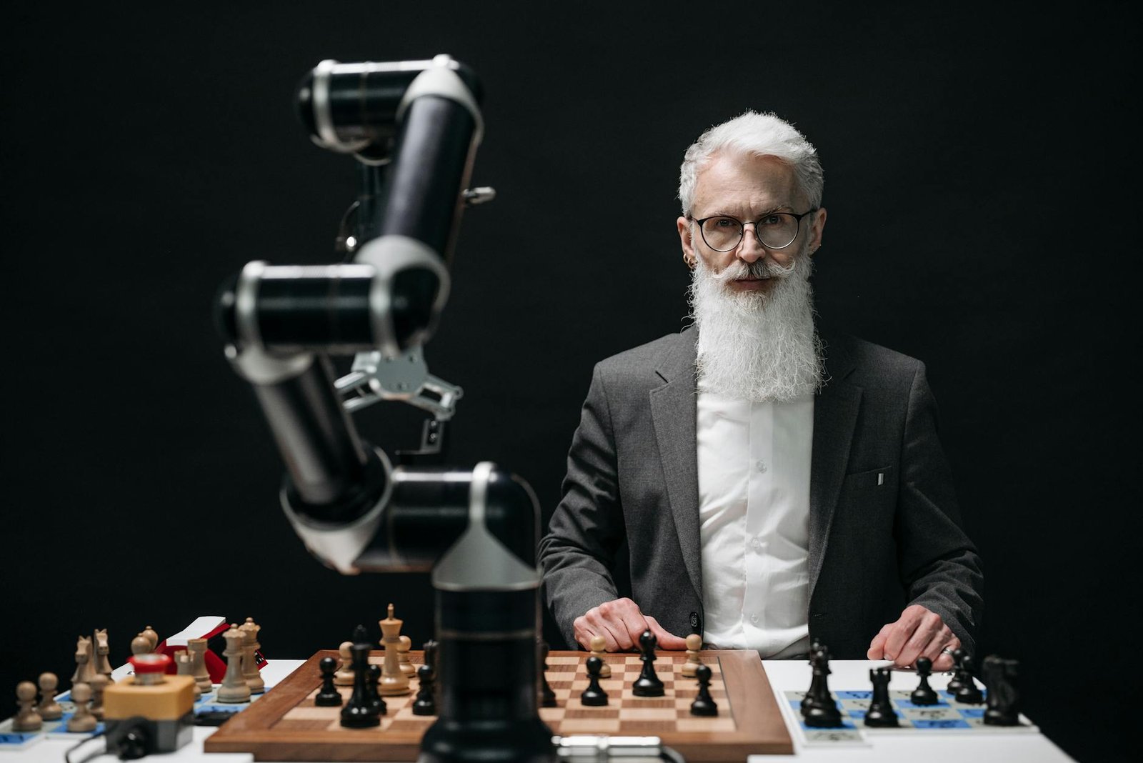 a bearded man playing chess
