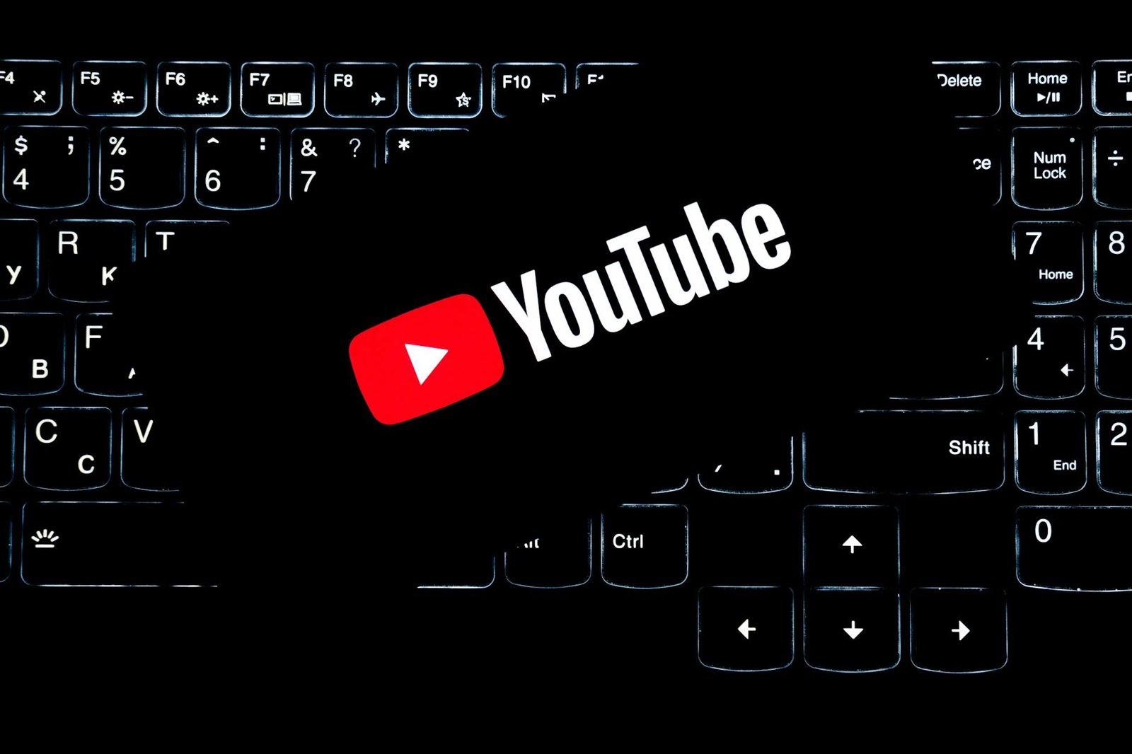 youtube logo on backlit keyboard digital media concept
