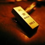 close up of gold bar with inscriptions