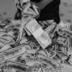 black and white photo of hundred bills