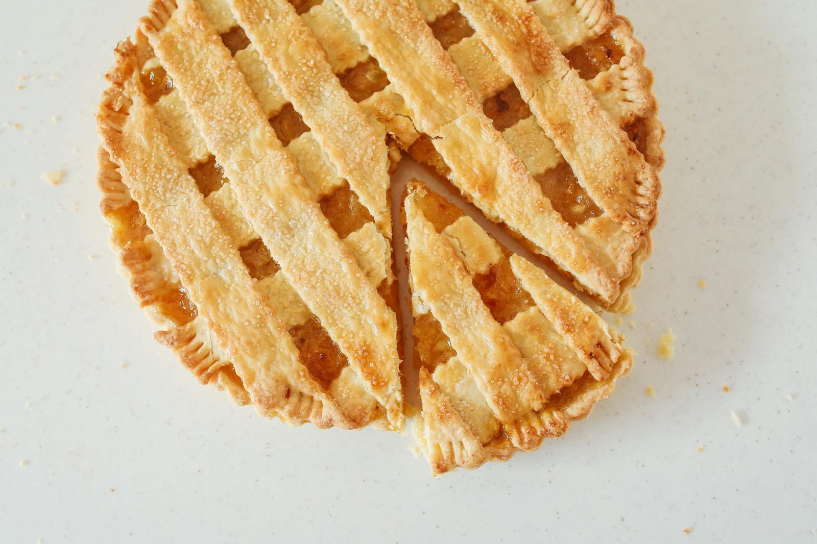 close up of a sliced lemon pie