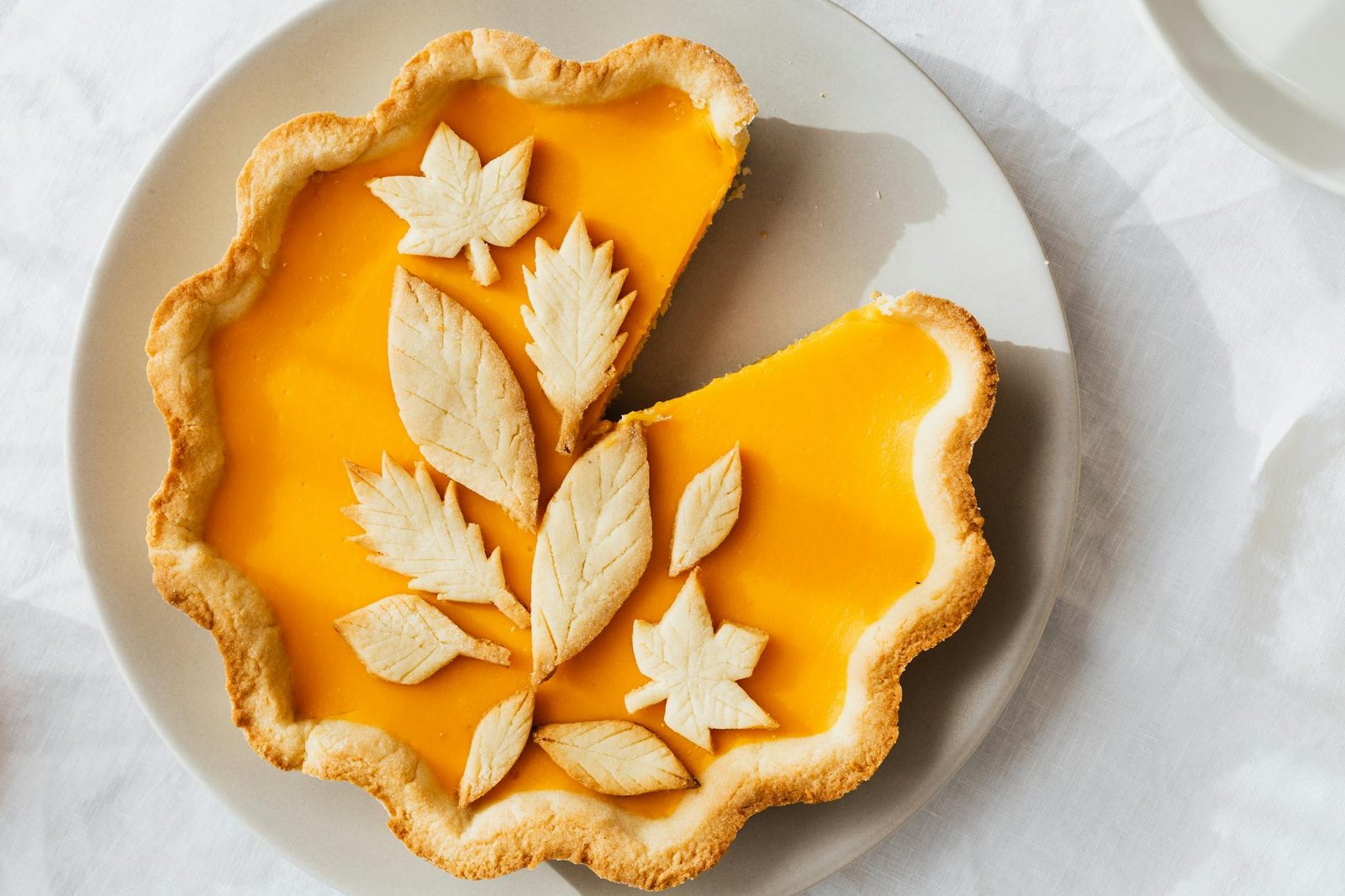 close up photo of sliced pumpkin pie