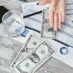 a money and document on the table