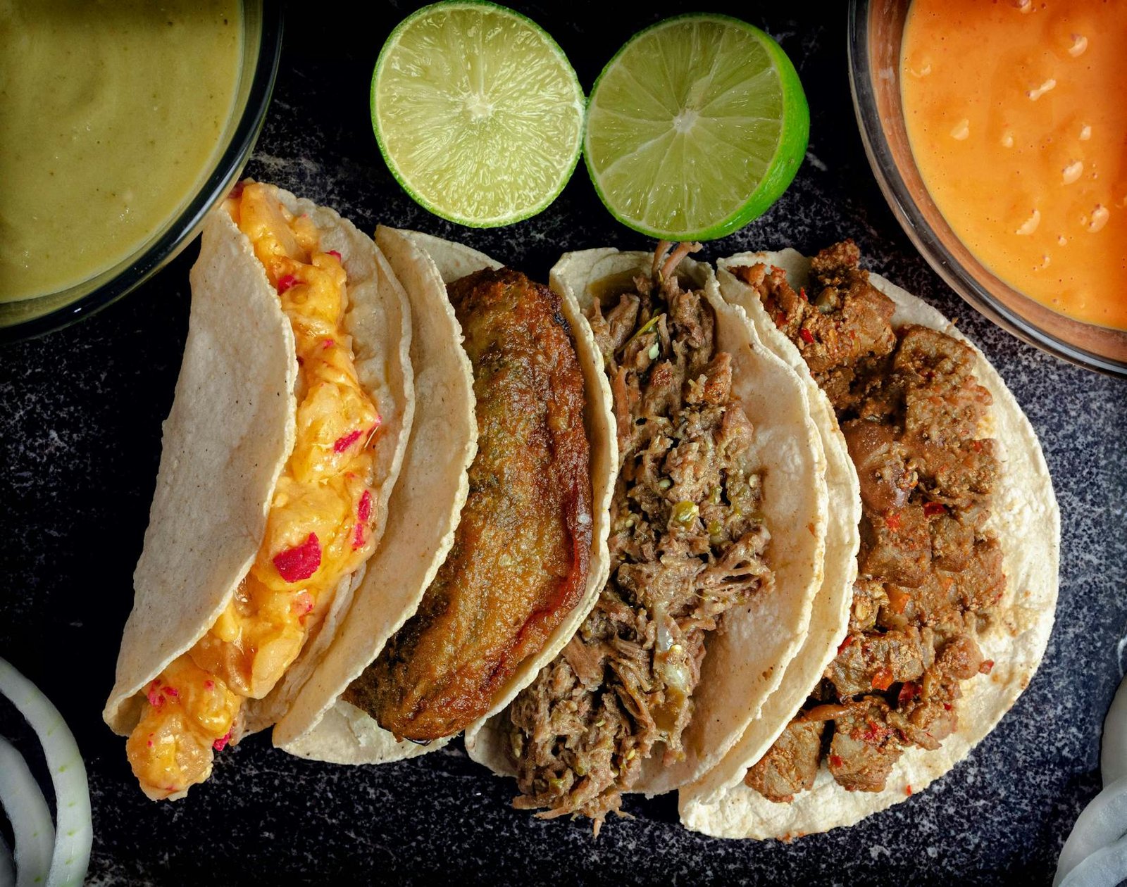 variety of tacos in close up photography