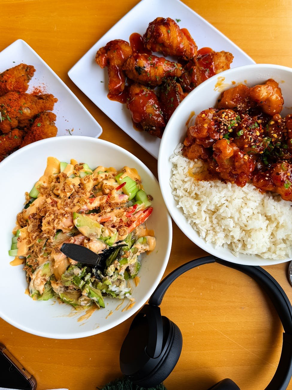 delicious asian fusion meals on wooden table