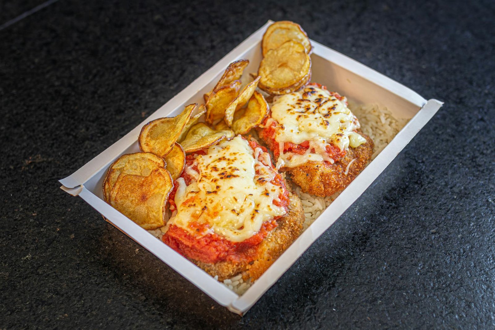 delicious brazilian chicken parmigiana with chips