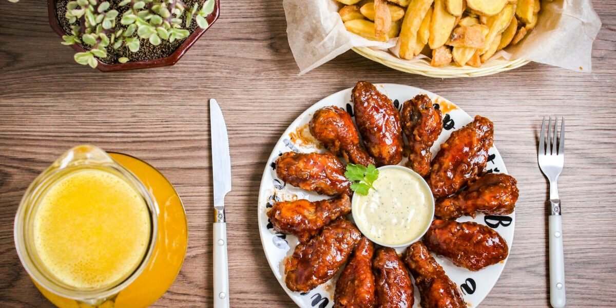 saucy fried chicken on a plate
