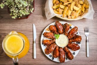 saucy fried chicken on a plate